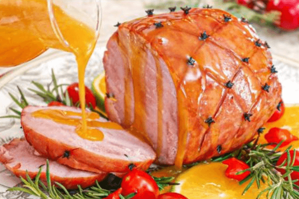 Pernil assado com molho de laranja